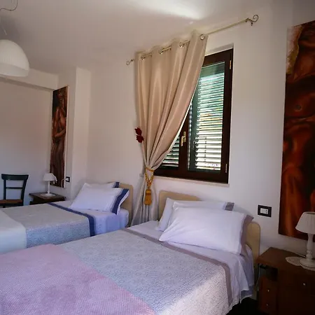 Alojamento de Acomodação e Pequeno-almoço Il Gigante Che Dorme Castel Castagna