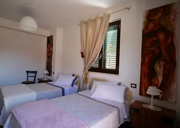 Alojamento de Acomodação e Pequeno-almoço Il Gigante Che Dorme Castel Castagna